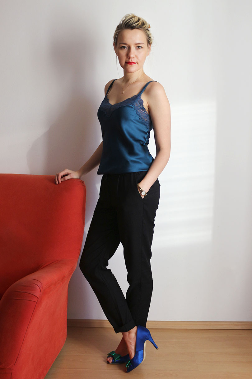 silk camisol and black trousers